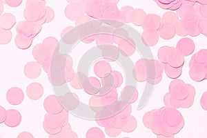 Pink festive confetti background.