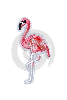 Pink flamingo embroidered patch isolated on white background