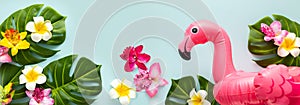Pink flamingo, tropical leaf monstera and orchid flowers on light background. Summer beach party concept. Flat lay, copy space