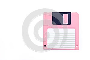 Pink Floppy disk on white background