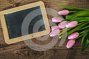 Pink flowers on the blackboard