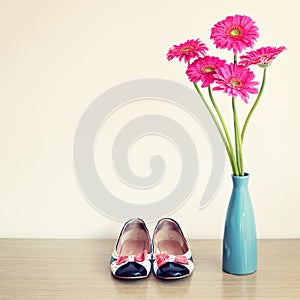 Pink flowers and girly shoes photo