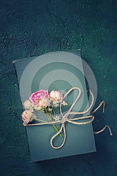 Pink flowers and the old book
