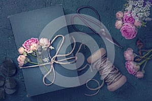 Pink flowers and the old book