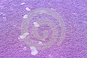 Pink of Footprint on cream sand for background