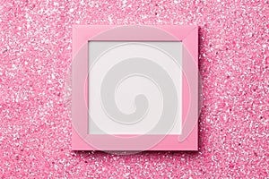 Pink frame on a shiny glitter background.