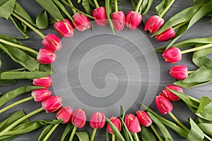 Pink Fresh Spring Tulips Botanical Art Floral Background Round Frame Wreath Wild Flowers Concept Woman`s day Greeting