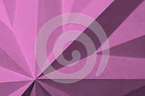 Pink, star shaped, origami as geometric abstract background.