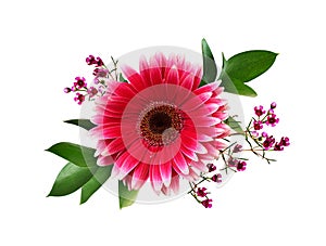 Pink gerbera, ruscus leaves and chamelaucium flowers in a floral arrangement