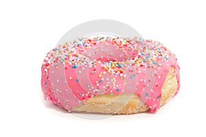 A pink glazed donut with speckles