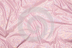 Pink glitter shiny textile abstract drapery background