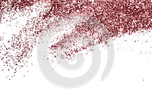 Pink glitter sparkles on white background