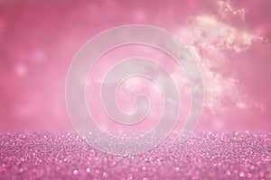 Pink glitter vintage lights background. de focused.