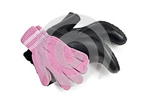 Pink gloves on black leather women's boots