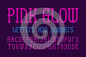 Pink glow letters and numbers with currency signs. Neon vibrant font. Isolated english alphabet