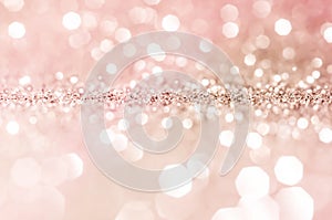 Pink gold, pink bokeh,circle abstract light background,Pink Gold shining lights, sparkling glittering Valentines day,women day or