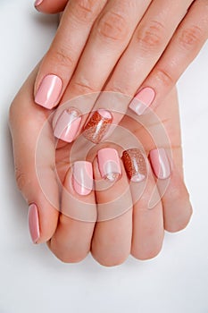 Pink gold manicure on short square nails