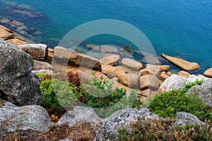 Pink Granit Boulders At The Atlantic Coast Of Ploumanach In Brittany, France