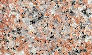 Pink granite rock polished surface texture