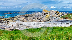 The pink granite rocks with strange shapes, coast in Brittany. T