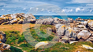 The pink granite rocks with strange shapes, coast in Brittany. T