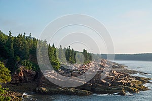 Pink Granite slabs line the rugged shoreline in Maine