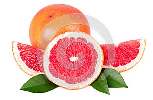 Pink grapefruit and slices isolated on white background. Fresh grapefruit with green leaves.