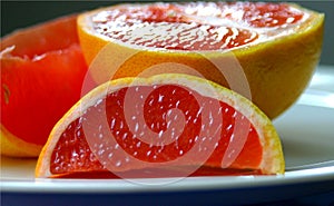 Pink Grapefruit slices on plate