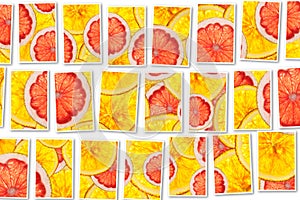 Pink grapefruits and oranges mix colorful sliced fruits collage
