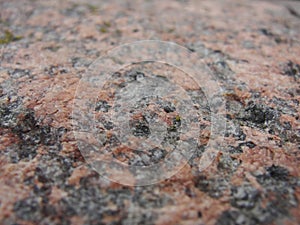 Pink-gray granite and old cement. background, texture. the parapet of the River. Granite stone abstract texture background.