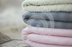 Pink and gray plaid with folded towel close-up