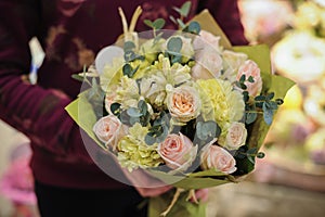 Pink green bouquet with rose and other flowers