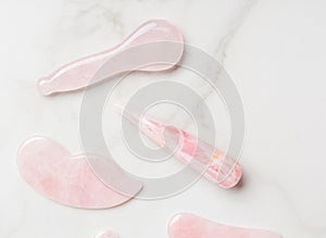 Pink gua sha facial massager tools photo