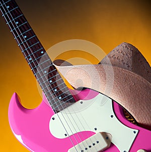Pink Guitar and Western Hat