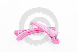 Pink hair clips isolated on the white background