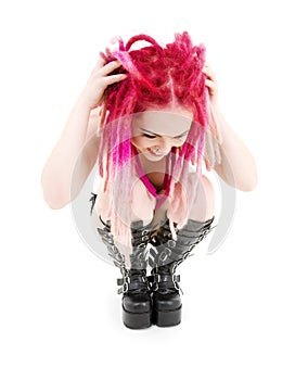 Pink hair girl in high boots