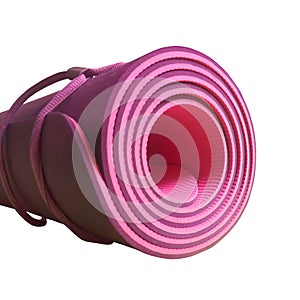 Pink half rolled yoga mat isolated on white background. Fitness and health. Exercise equipment. Yoga and pilates