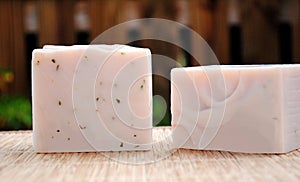 Pink Handmade Soap Bars With Wooden Fence Background