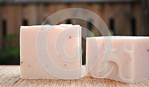 Pink Handmade Soap Bars With Wooden Fence Background W