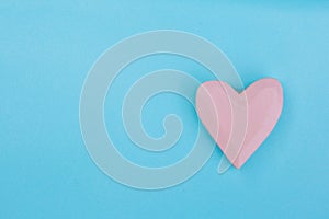 Pink heart on a light Blue Background