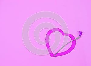 Pink heart with a little flower on pastel pink background. Valentines day, Mother day or celebration concept