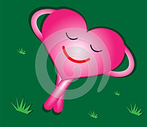 `Pink heart resting with a smiling face on the green grass.Living with a heart full of happiness.The heart is full of love and hap