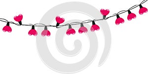 Pink heart shaped fairy lights on white background