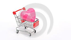 Pink heart in a shopping cart on a white background