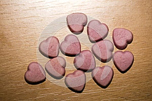 Pink hearts home made pills macro background fifty megapixels prints exstacy mdma