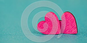 Pink hearts on a turqouise background, valentine greeting card, mothers day and birthday wishes, love symbol