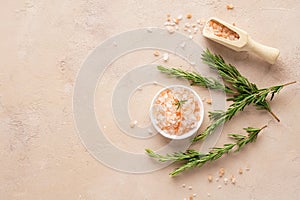 Pink Himalayan salt with fresh rosemary twigs