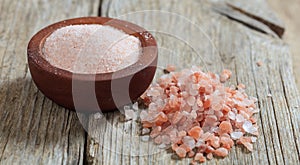 Pink Himalayan salt on a table photo