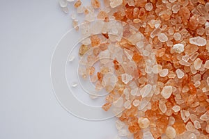 Pink Himalayan salt on a white background