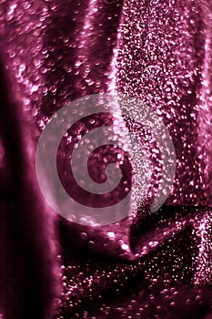 Pink holiday sparkling glitter abstract background, luxury shiny fabric material for glamour design and festive invitation